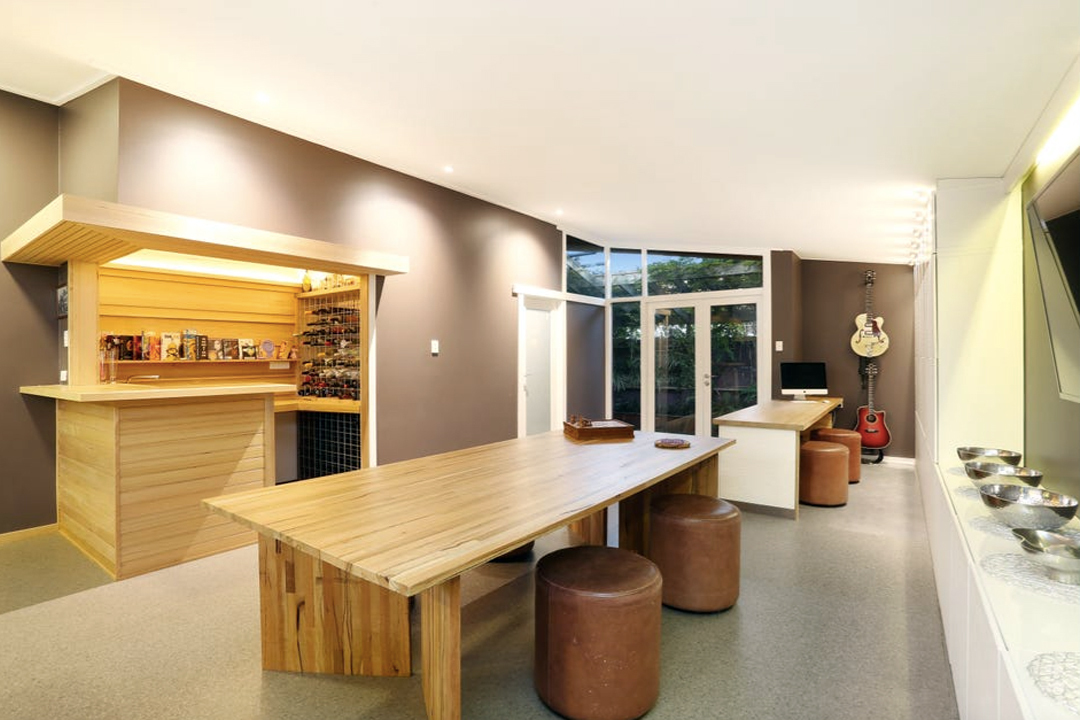 East Victoria Park renovation by Build 32 Construction — open-plan living and bar area