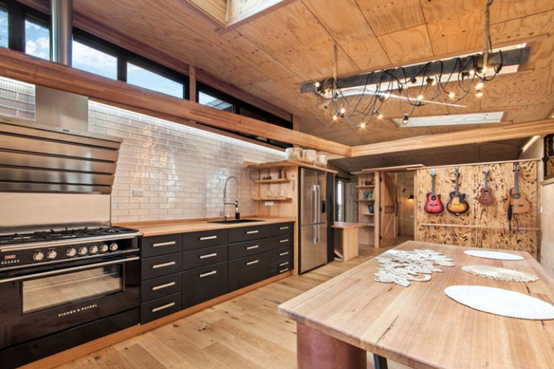 Plywood-lined kitchen and dining with solid timber joinery by Build 32 Construction, Perth